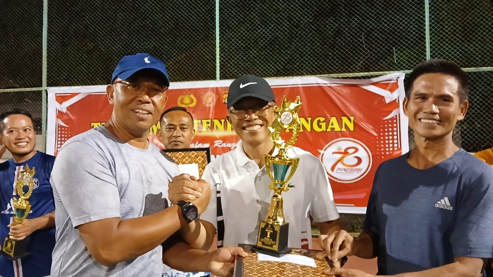 Pj Bupati Lombok Timur Juara Tennis Lapangan HUT Bhayangkara Ke – 78